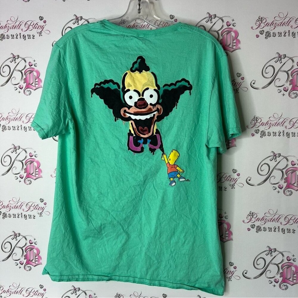 The Simpson tee shirt Green Graphic T-Shirt with Cartoon Design